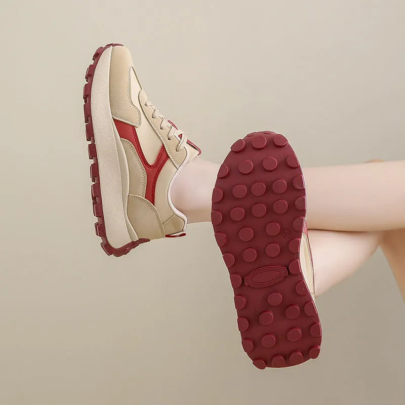 Women's low-top platform sports shoes in card black colour with lace-up front and rubber sole