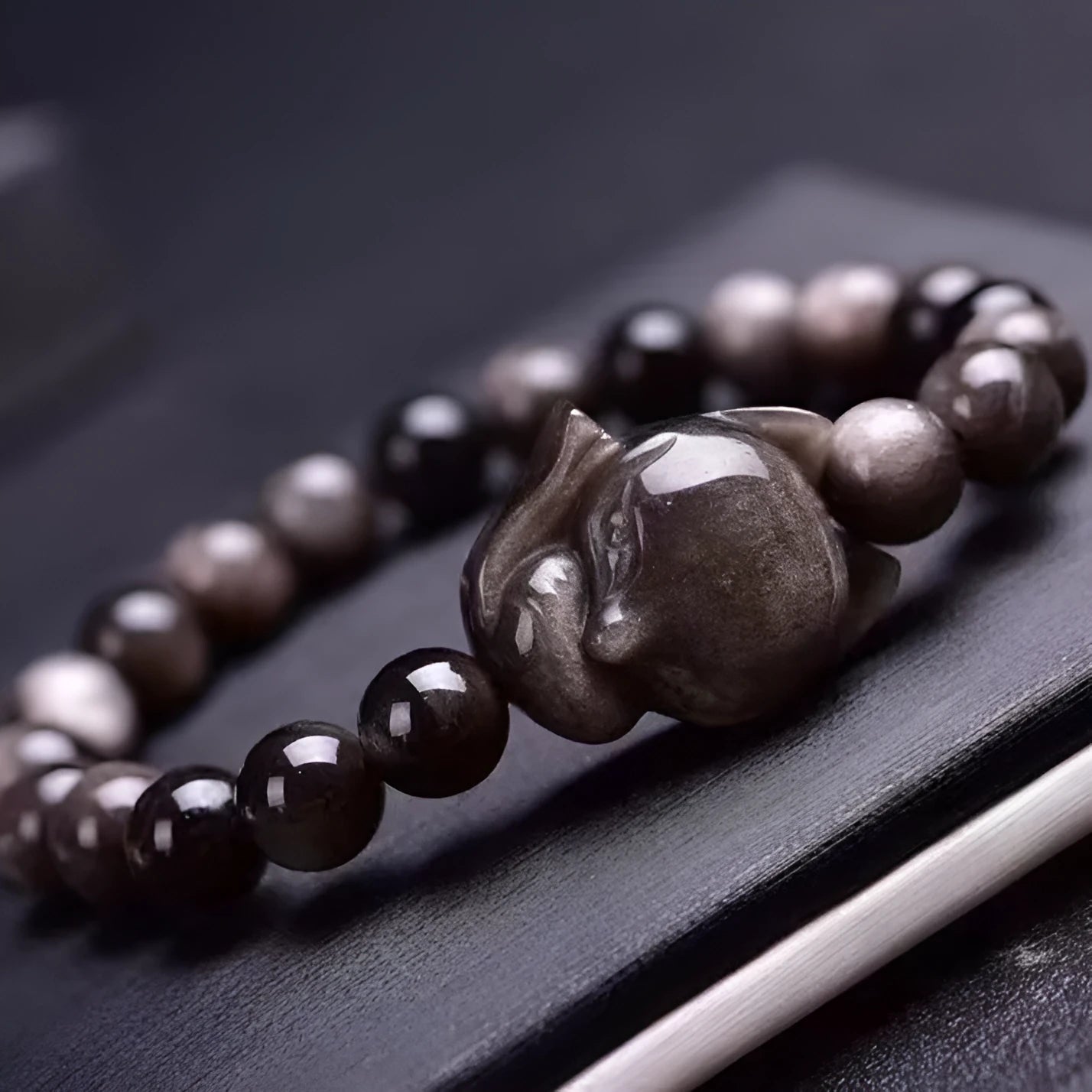 Obsidian bracelet with silver fox charm and 8mm polished bead