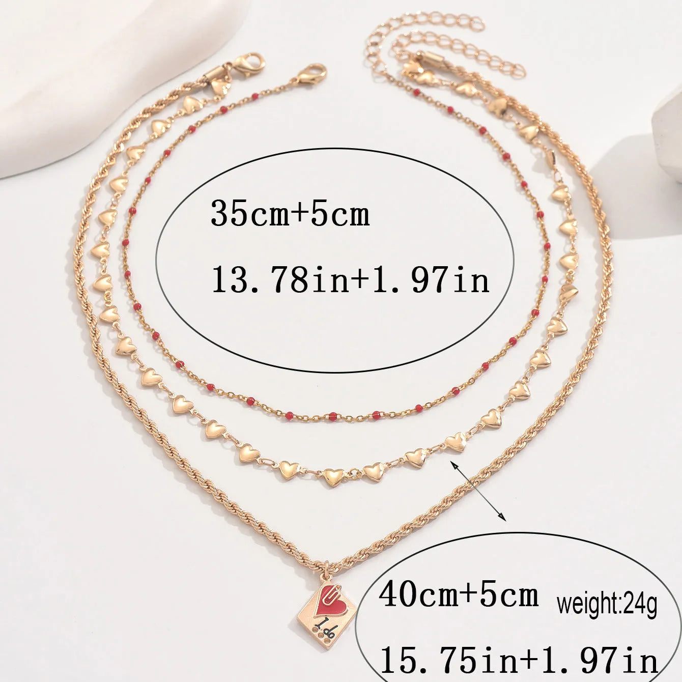 Silver-tone adjustable clavicle chain necklace with a geometric heart pendant on a three-layer chain.