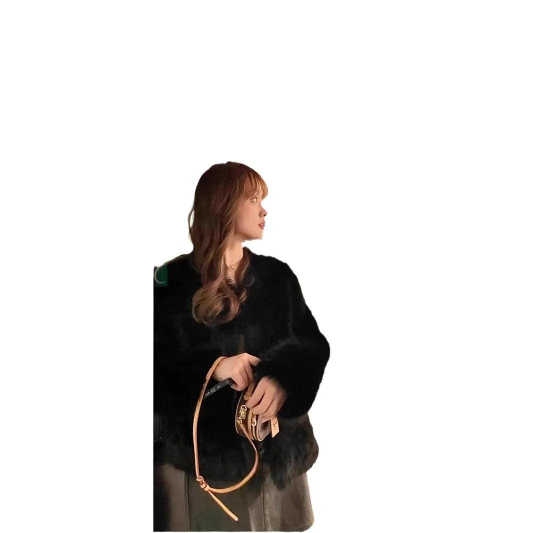 Chenille women's coat with princess sleeves in black colour, regular 50cm length