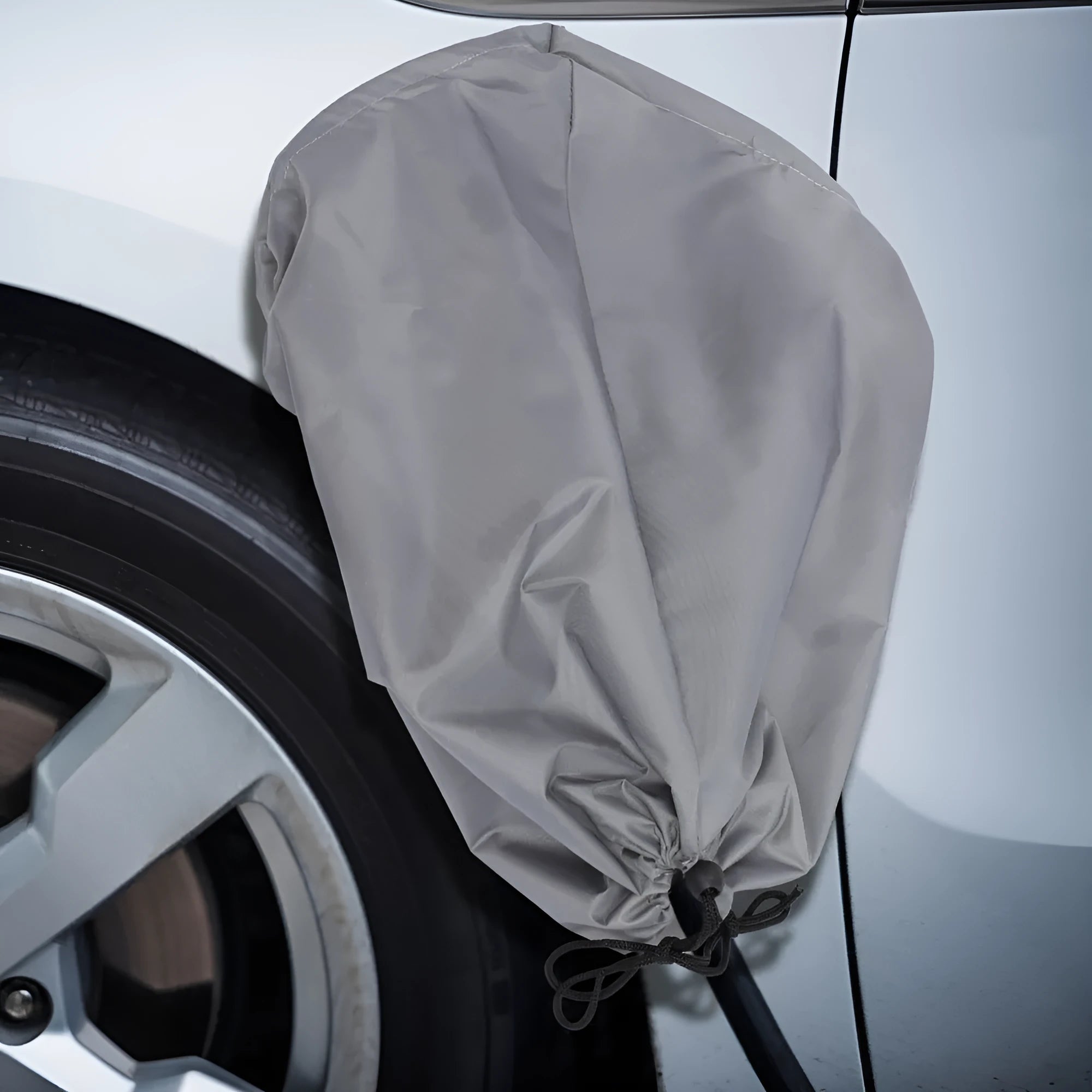Waterproof drawstring cover for electric vehicle charging port in grey colour