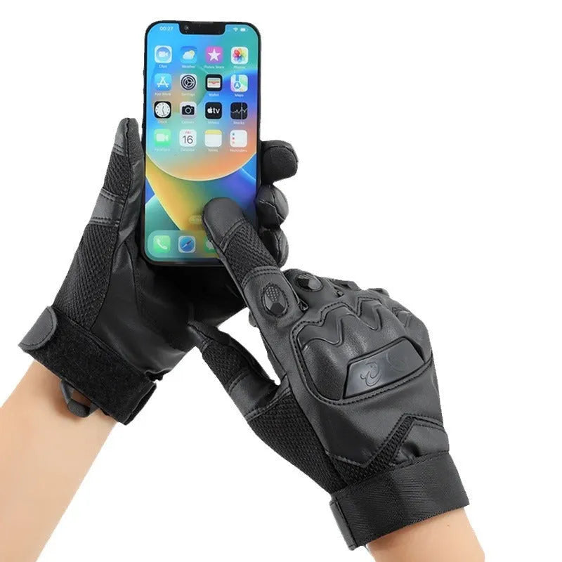 Men's black full finger tactical gloves with touch screen fingertips on a hand.