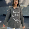 Women's light khaki alpaca wool pullover sweater with retro turtleneck and oblique zipper.