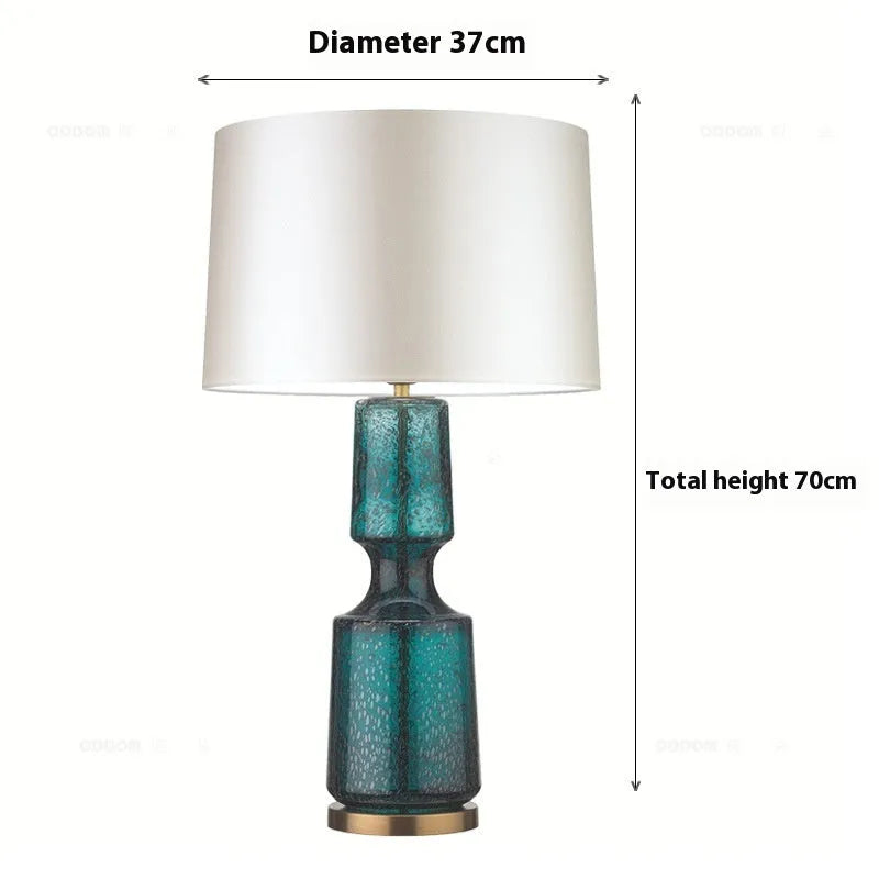 Simple glass art table lamp in blue-green large 76x38cm on a living room side table
