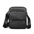 Men's first layer cowhide genuine leather crossbody bag in black, 16.5x7x21cm, solid colour street trend style