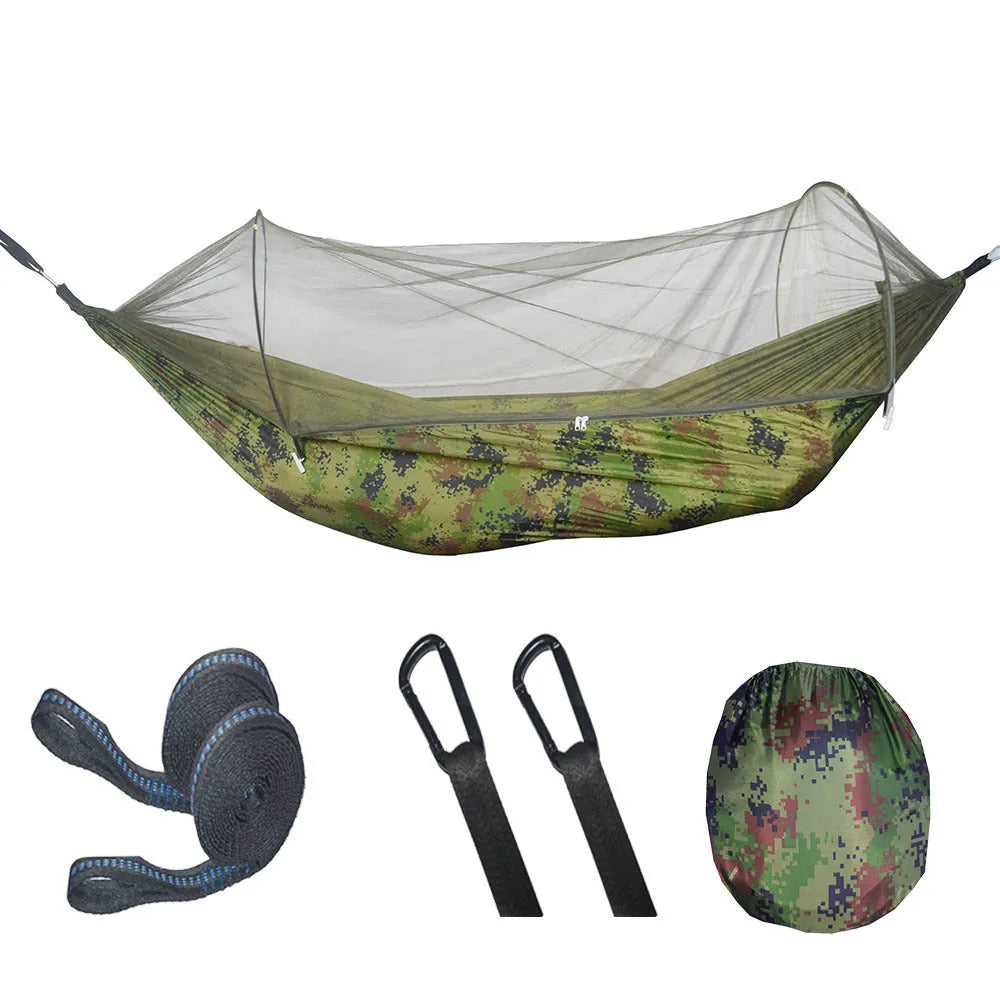 Outdoor camping automatic quick unfolding nylon hammock in camouflage colour with trees in background