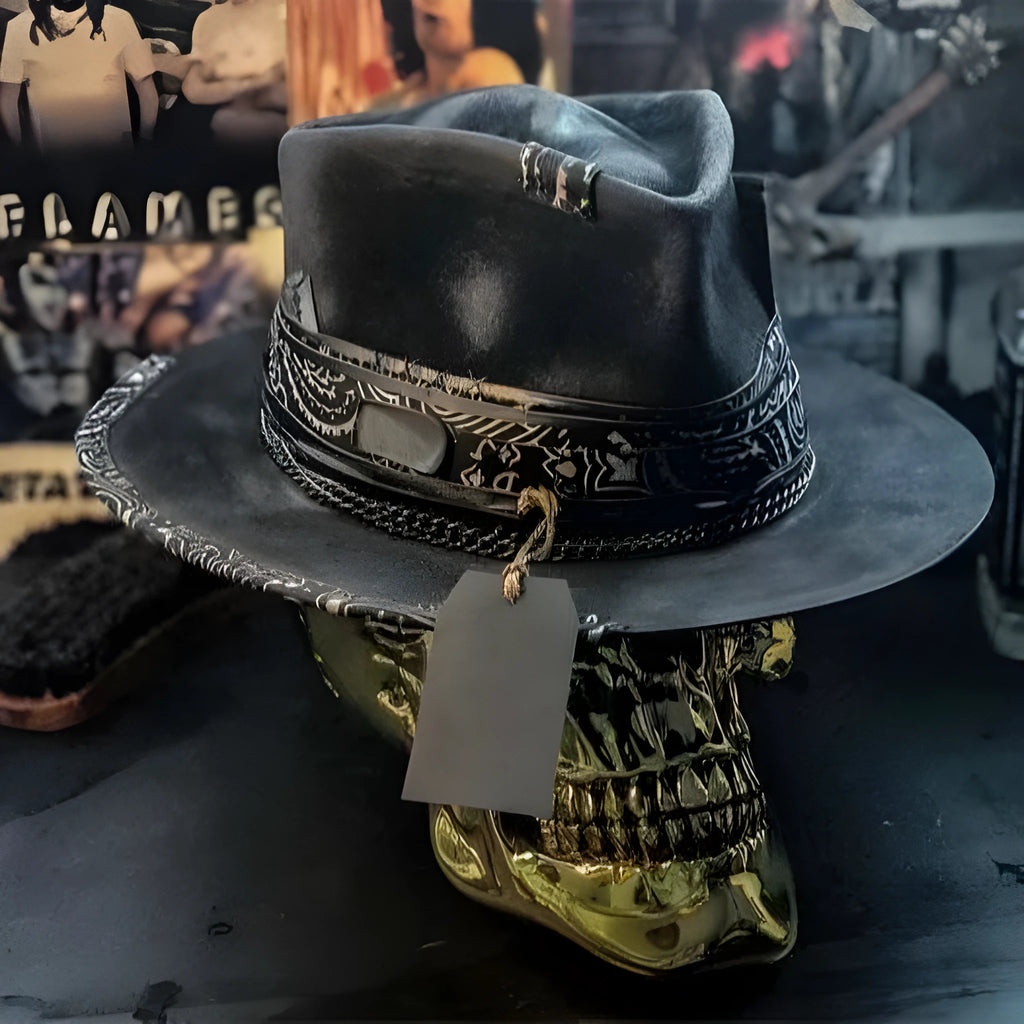 Handmade wool skull hat with conical crown and black and white embroidery for Halloween costumes.