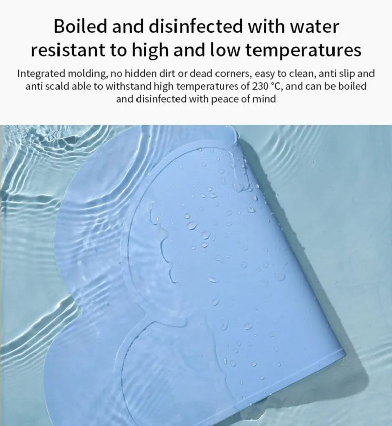 Solid colour silicone pet feeding mat placed under dog bowl on floor