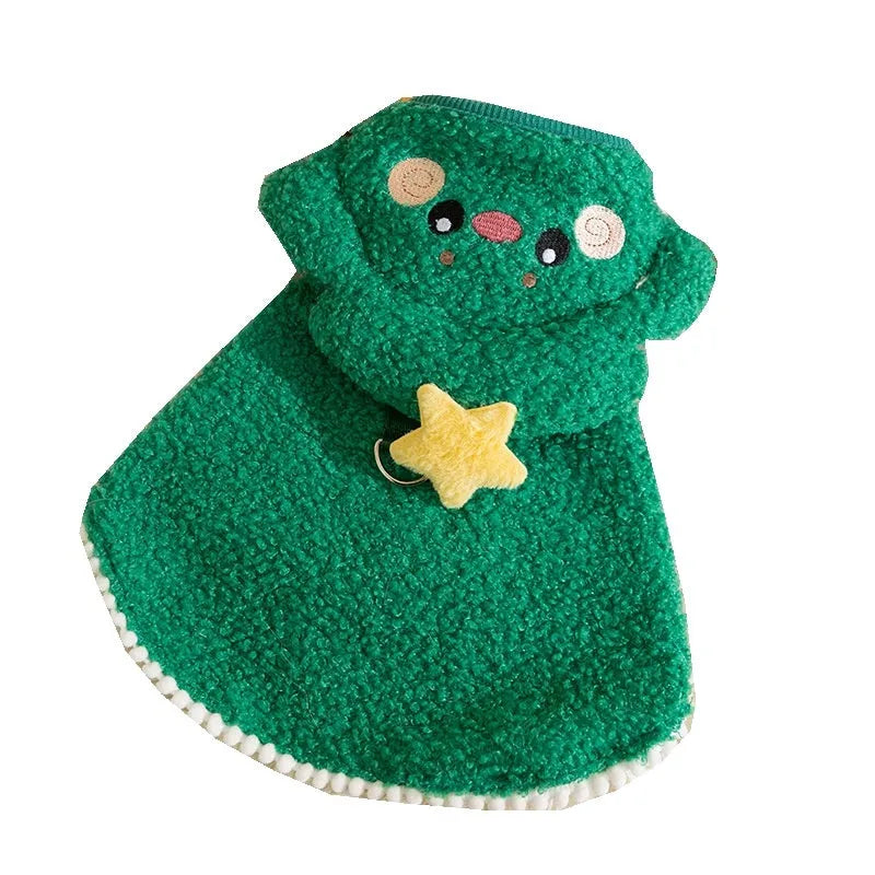 Green granular velvet cat cape with Christmas tree hat and star, lying on a white background