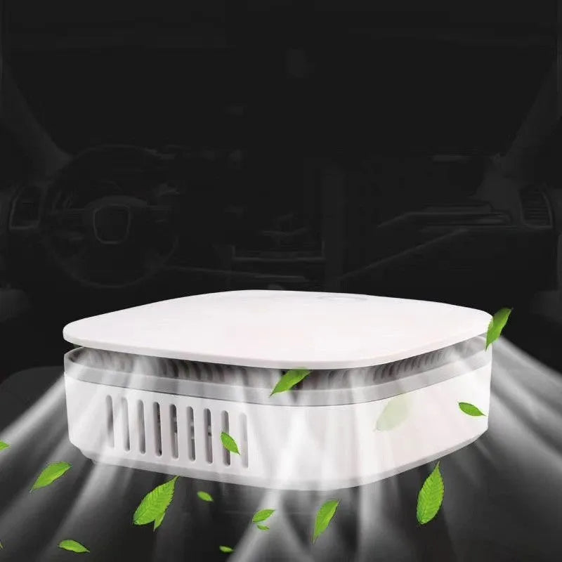 White USB-powered air purifier for cars and small rooms with ozone negative ion sterilisation.