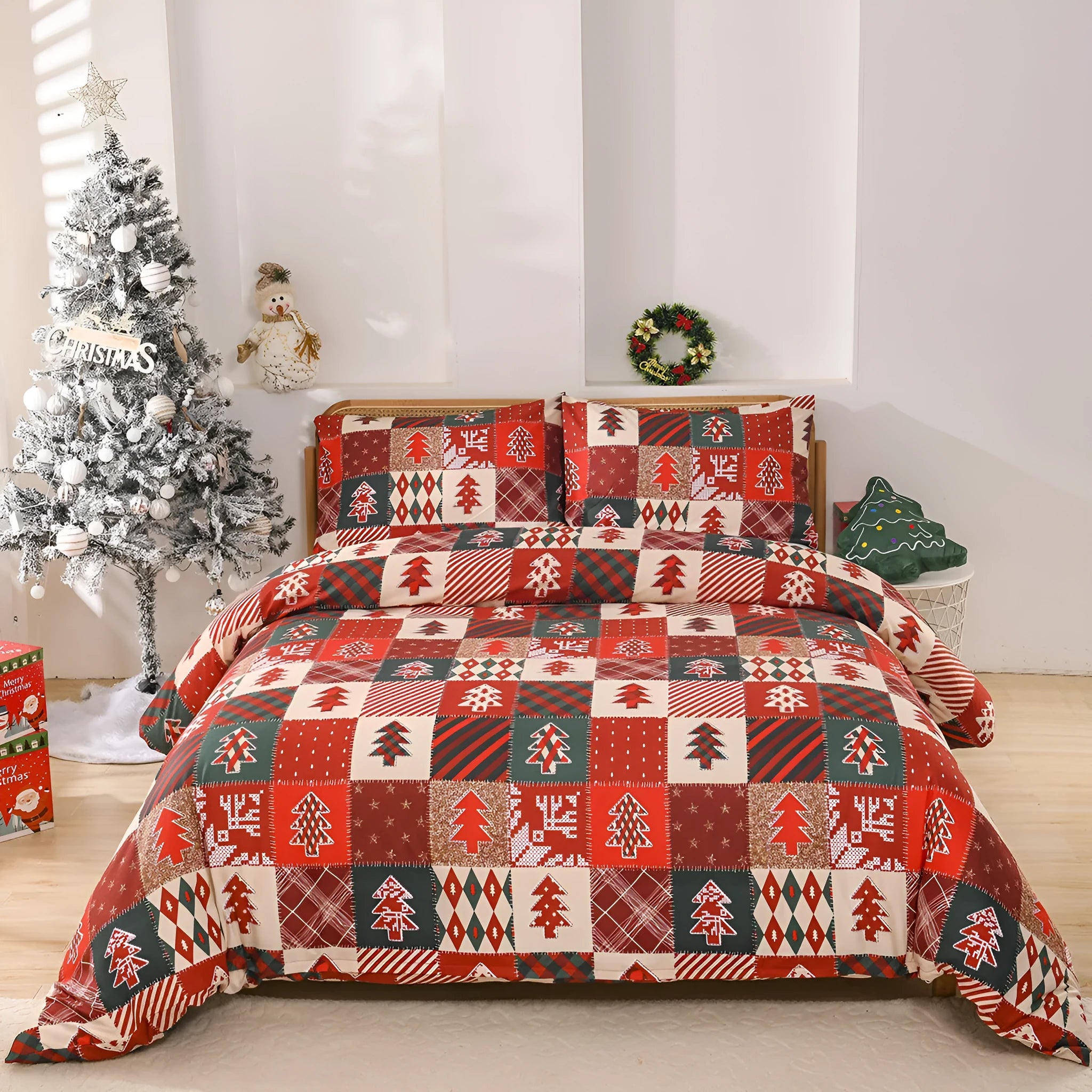 Red plaid Christmas bedding three-piece set with quilt cover and pillowcases on bed