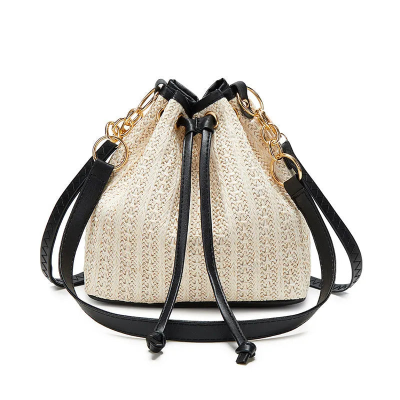 Straw woven women's crossbody shoulder bag with contrast colour trim and phone pocket