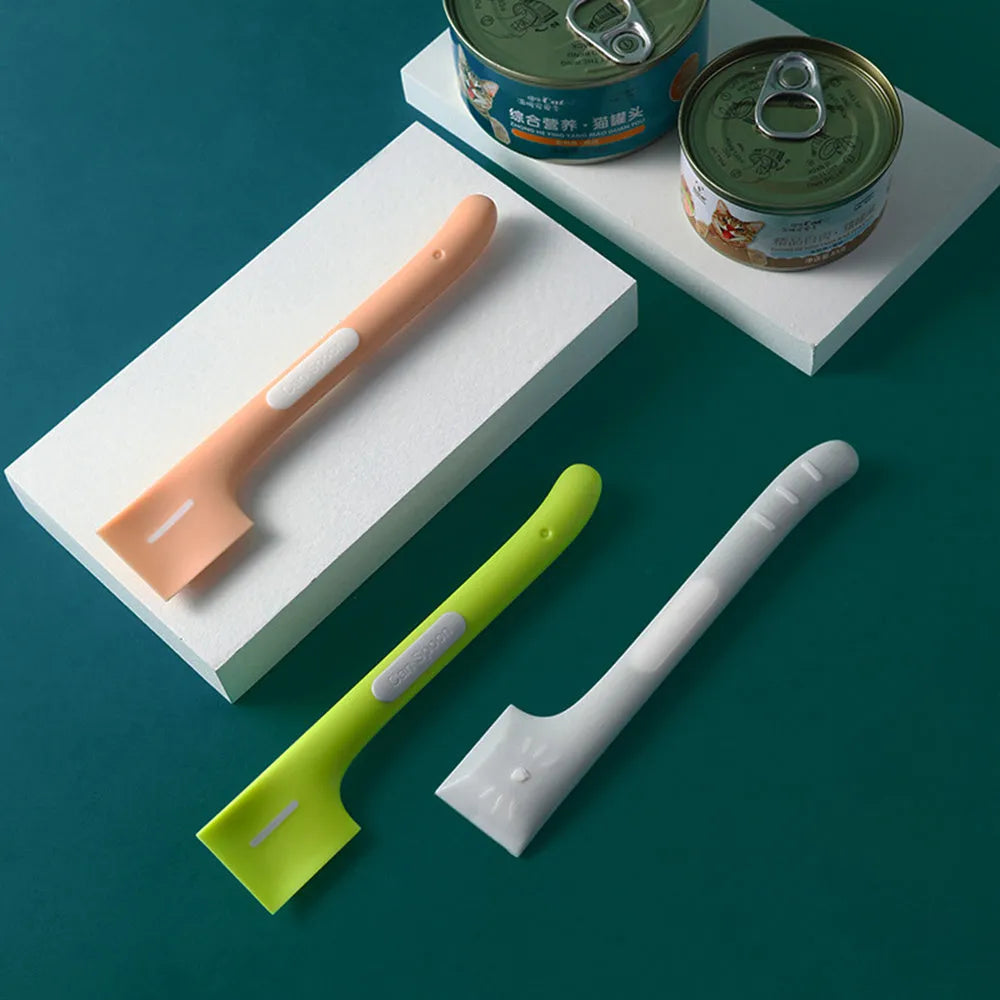 Green, pink, and purple long-handle TPR spoons for scooping canned wet food for cats and dogs.