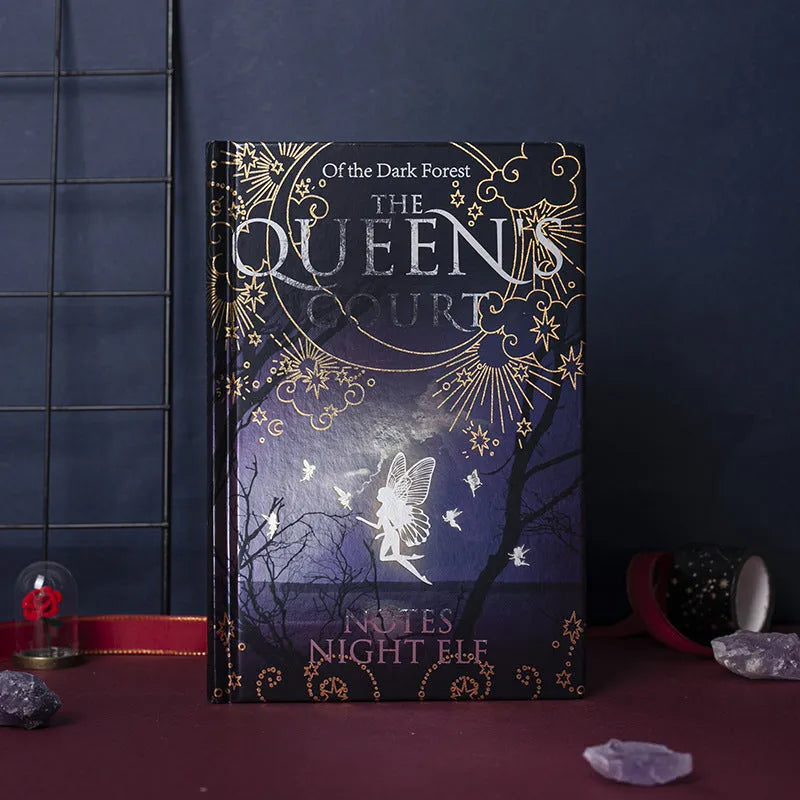 Blue luminous hardcover A5 notebook with retro Night Elves design, open to show full-colour illustrated pages.