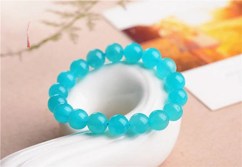 Grade 7A Amazonite natural scattered beads in blue-green ice colours with polished surfaces
