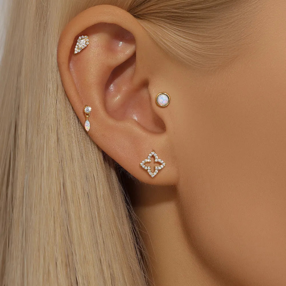 A pair of S925 sterling silver flat column thread ear bone studs in a gold electroplated finish.
