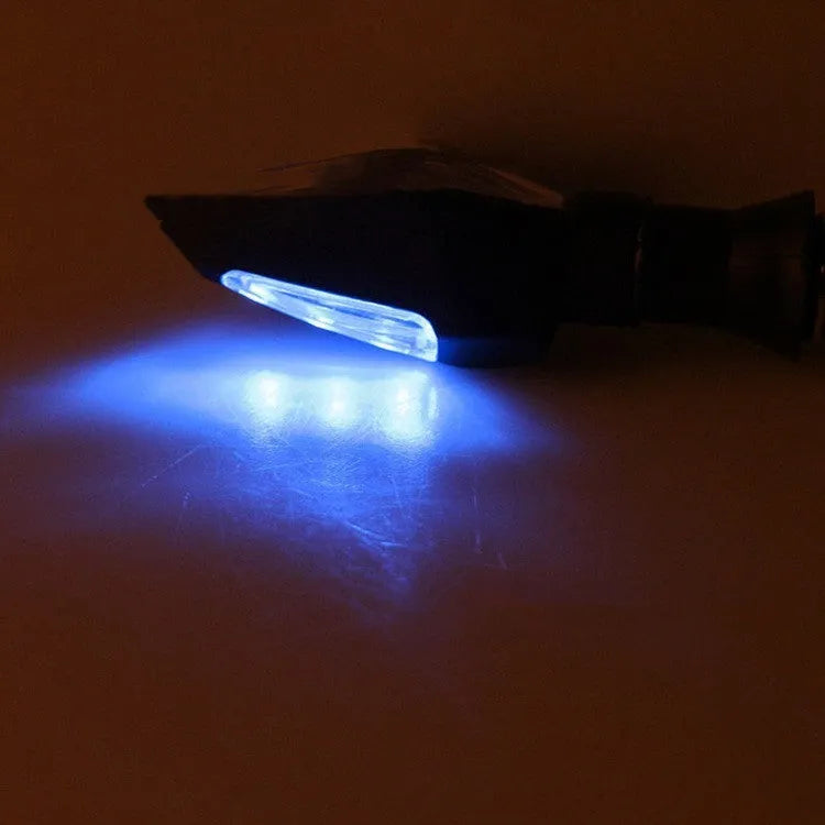Double-sided luminous LED turn signal for motorcycle with yellow and blue light options, plastic housing, 12V