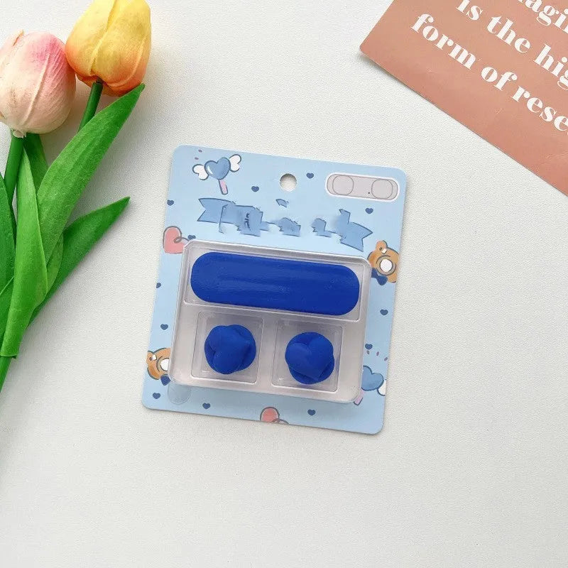 Plastic cartoon magnetic data cable fixer for desktop organisation, shown in one of ten available colour styles.