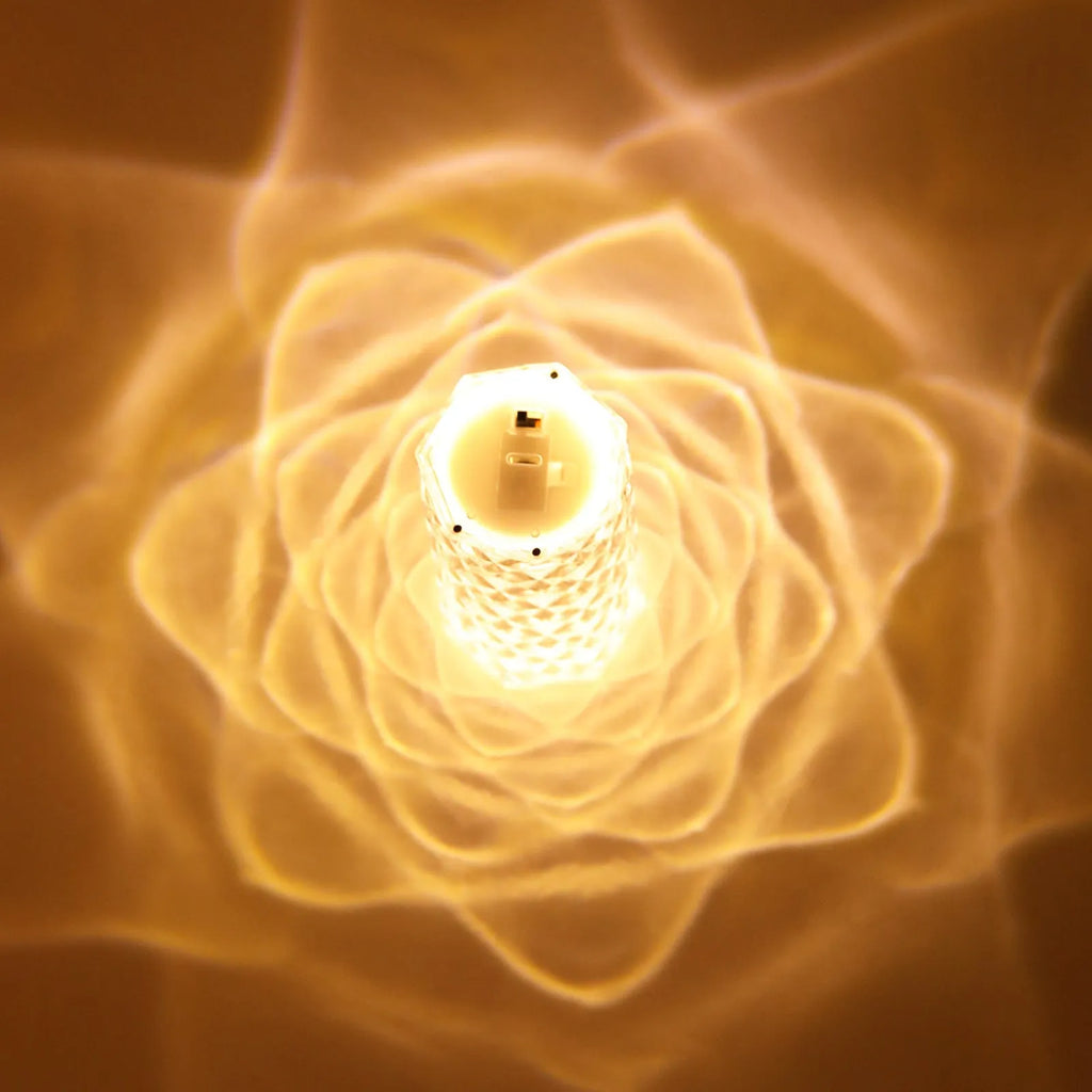 Clear acrylic crystal rose petal table lamp with plastic LED, warm white light, compact 12.2cm size on a desk