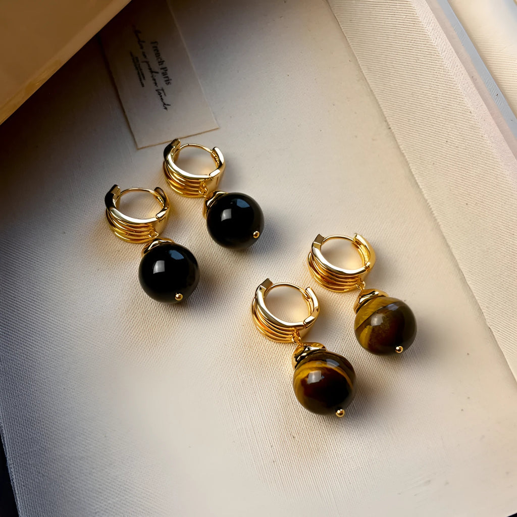 A pair of round geometric tigereye gemstone earrings with real gold plating in a French retro style.