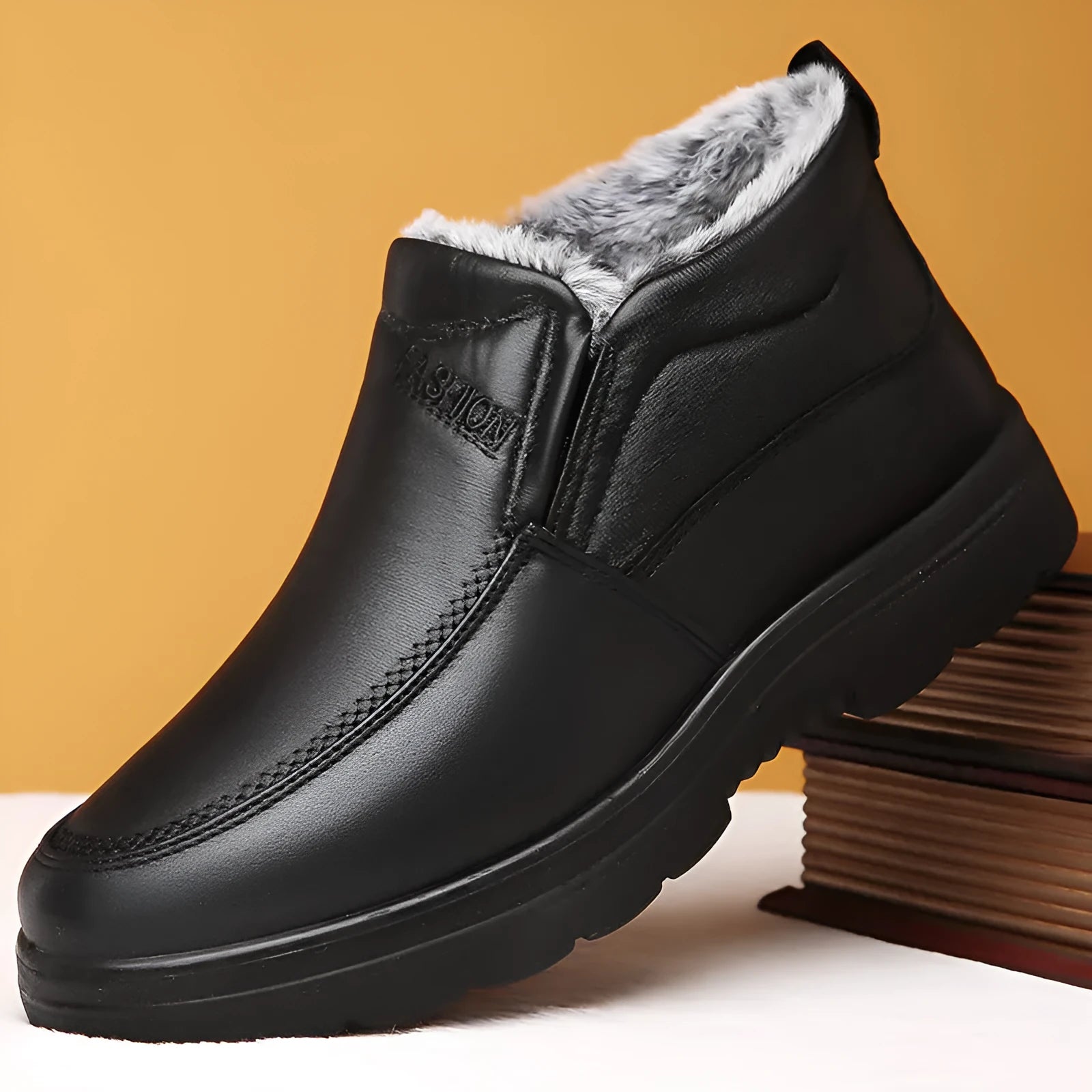 Men's black and brown winter slip-on shoes with a fleece lining and rubber sole.