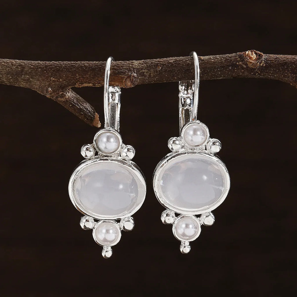Silver round crystal eardrops with artificial pearl and geometric petal design on alloy base