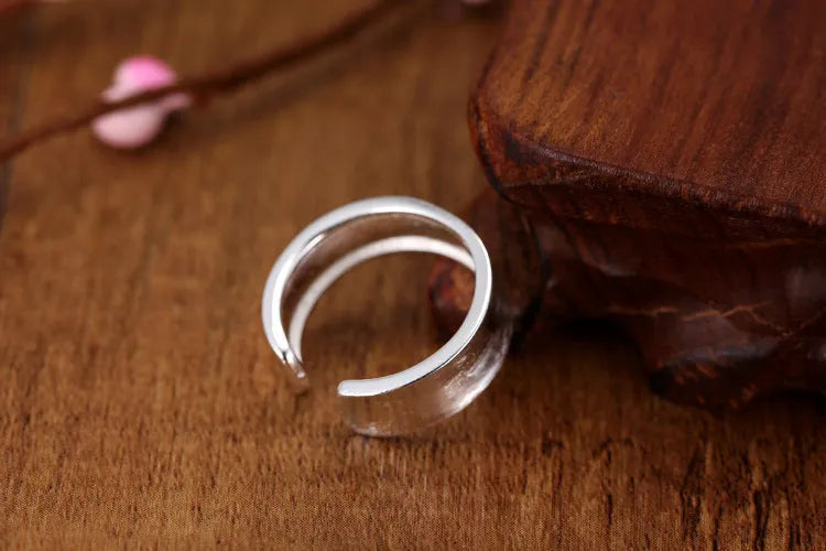 Adjustable open ring with geometric shape in frosted sterling silver with electroplated finish
