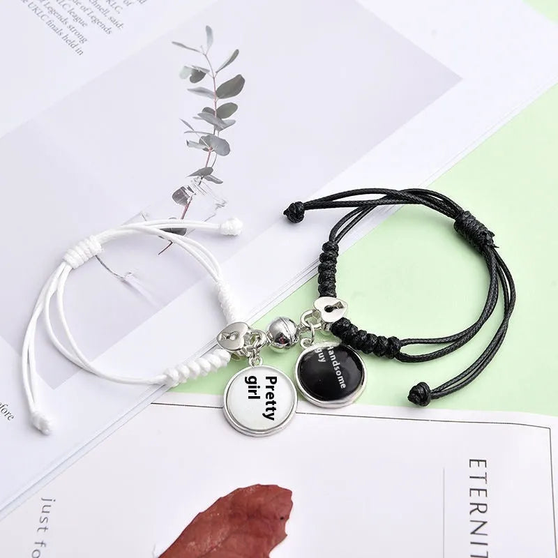 Alloy magnetic suction bracelet pair for couples with symbolic design options