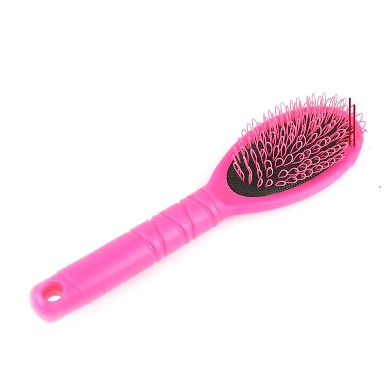 Black ring tooth hair extension comb with airbag cushion handle on white background
