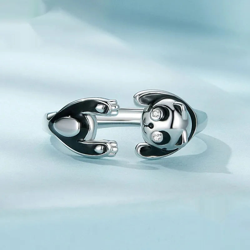 Sterling silver adjustable panda ring with white gold plating showing open bracelet design