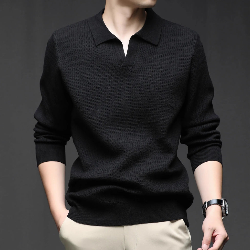 Men's loose fit long sleeve pullover sweater in green, shown flat.