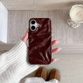 Niche irregular pleated three-dimensional TPU phone case in wine red for iPhone