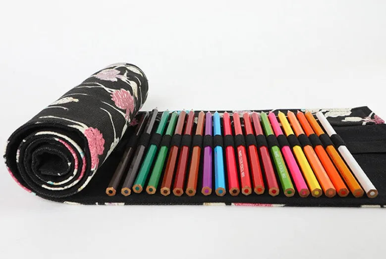 Square canvas rolling pencil case with ballet girl print, shown with curtain unrolled to reveal multiple pencil holes.