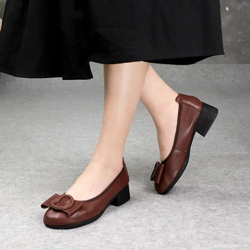Low-cut genuine cowhide leather women's mid heel slip-on round head pumps in black wedge heel style