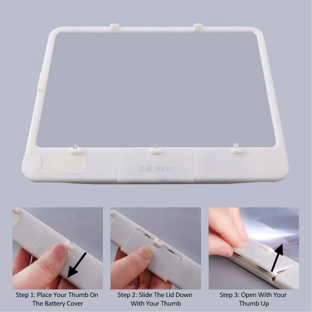 Black handheld 3x magnifying glass with built-in white LED light on a PVC handle.
