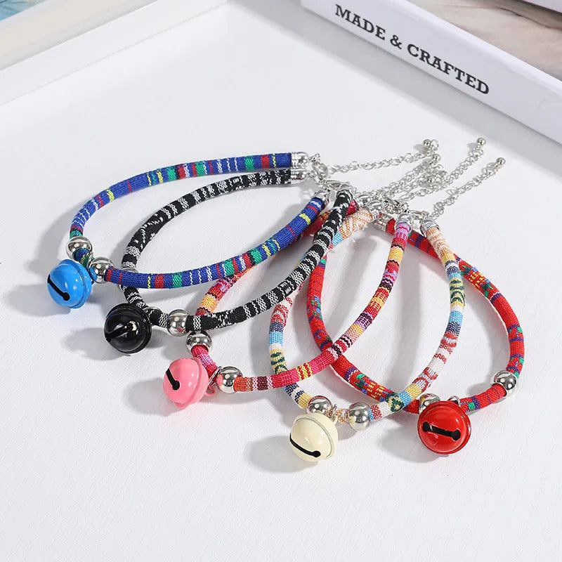 Coloured ethnic pattern adjustable pet collar with small bell for cats and dogs.