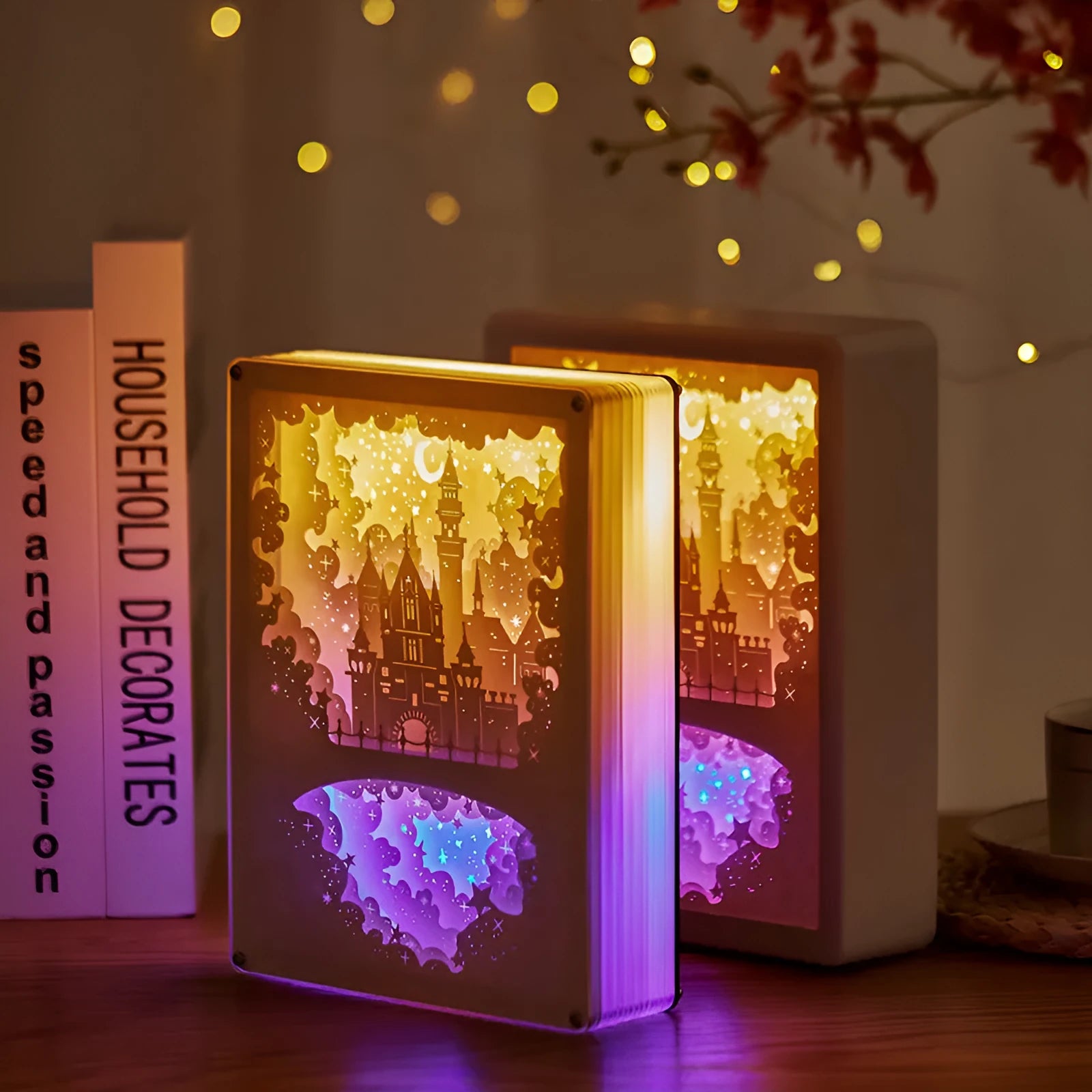 Three-dimensional paper carving USB night light with remote control on bedside table
