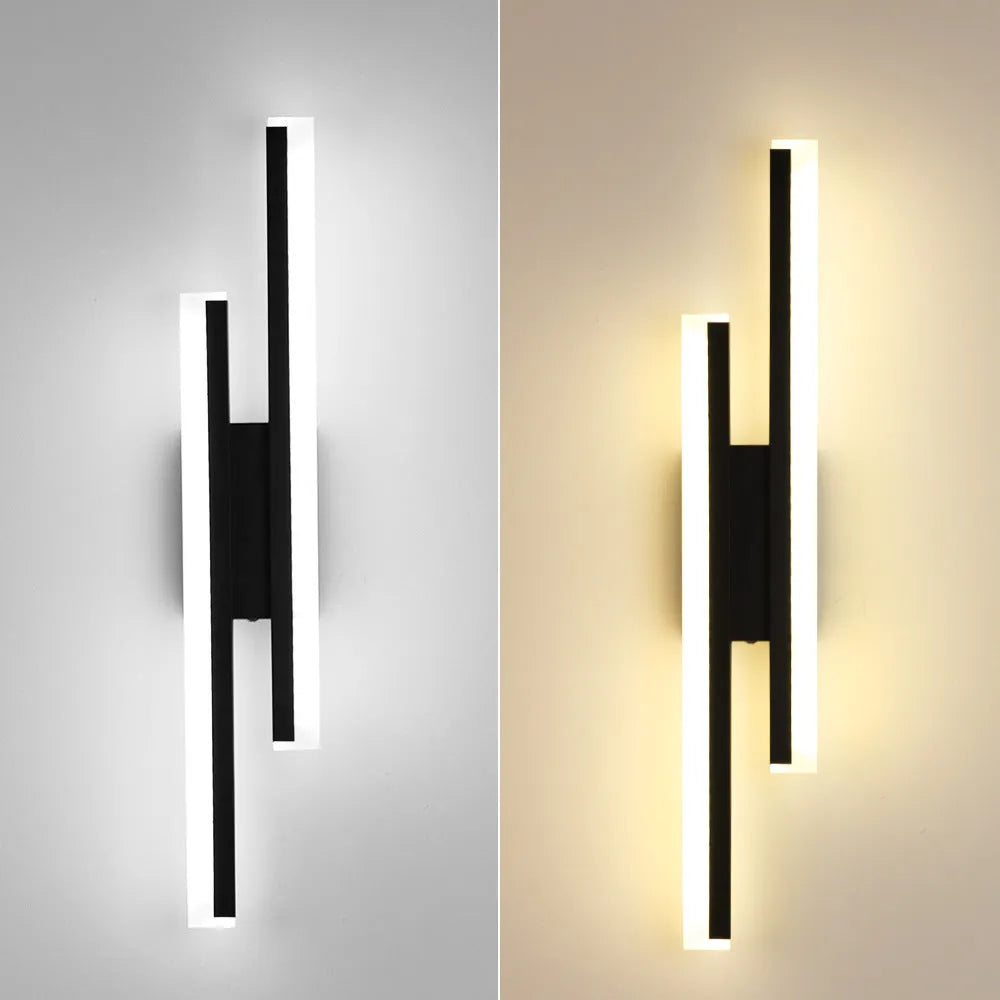 Gold double line wall lamp with linear LED lighting mounted on corridor wall