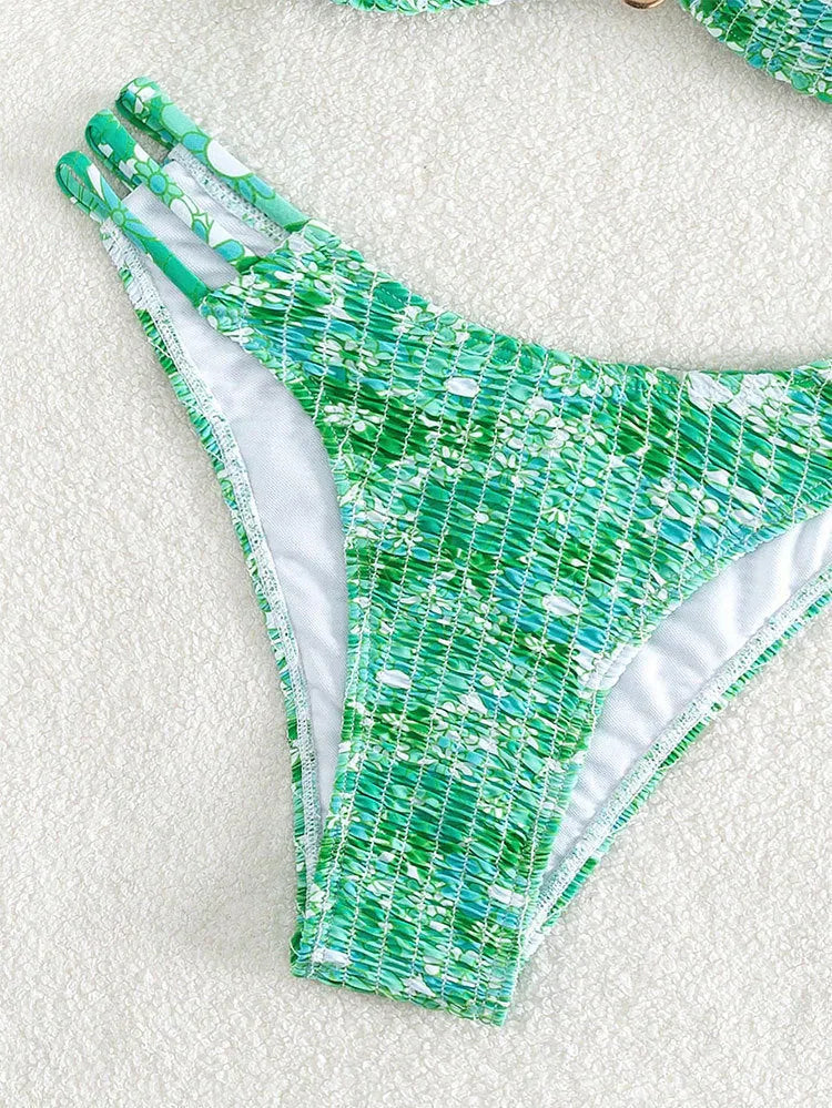 Women's floral bikini swimsuit with high-waist design in blue colour