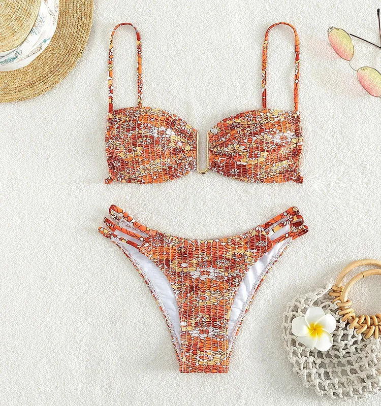 Women's floral bikini swimsuit with high-waist design in blue colour
