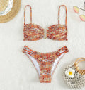 Women's floral bikini swimsuit with high-waist design in blue colour