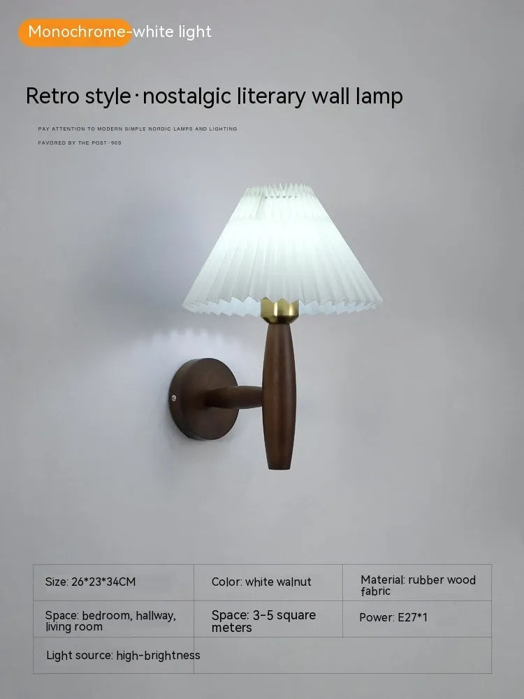 American retro walnut wood wall lamp with fabric shade on a wooden bedside table