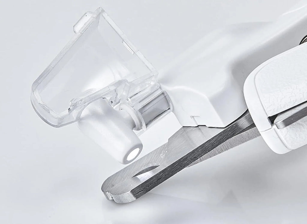 White pet nail clippers with LED light, anti-splash transparent guard, and a leather-like handle on a blue background.