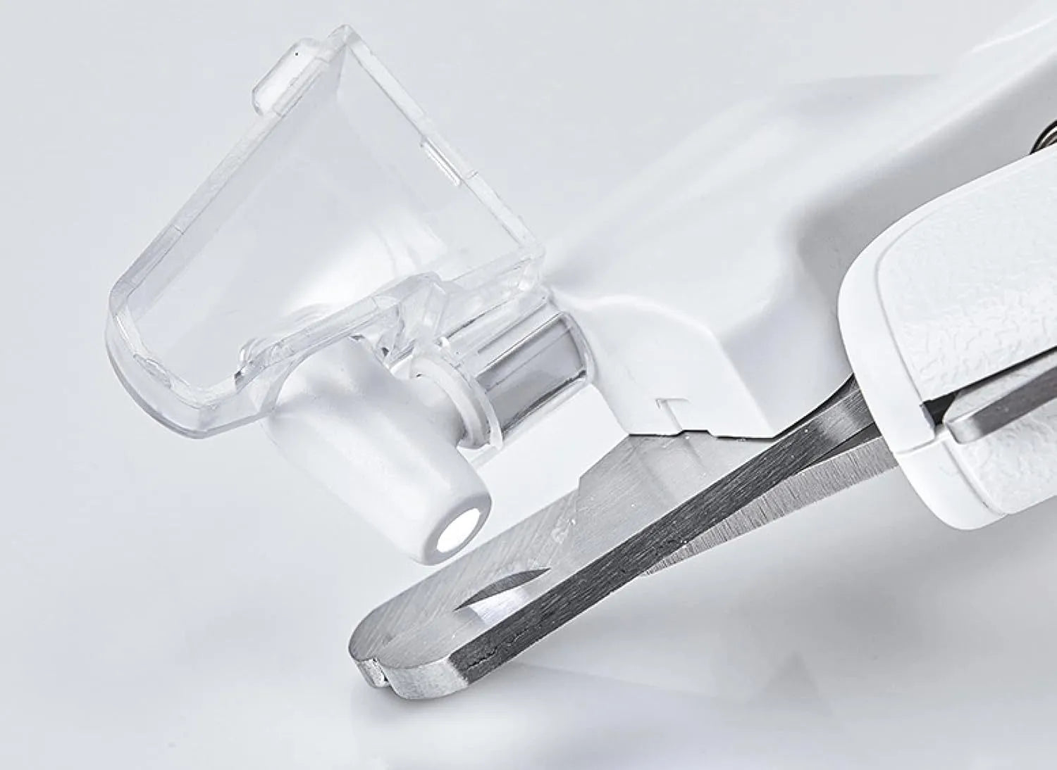 White pet nail clippers with LED light, anti-splash transparent guard, and a leather-like handle on a blue background.