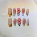 Zebra pattern hand carving nail art with embossed flower and leopard print designs in four sizes