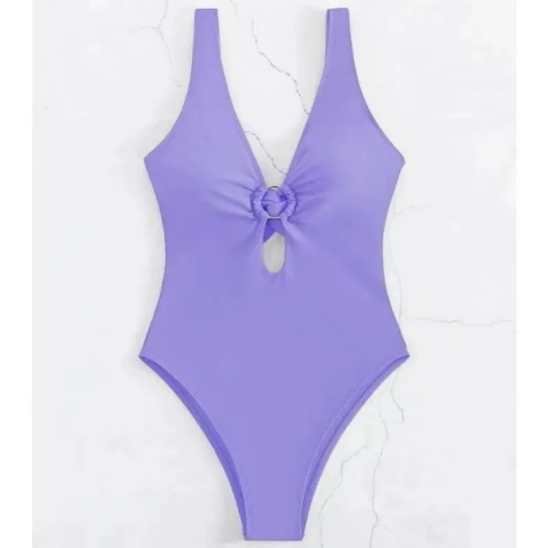 Women's solid colour one-piece polyester swimsuit for swimming and wading, available in multiple colours