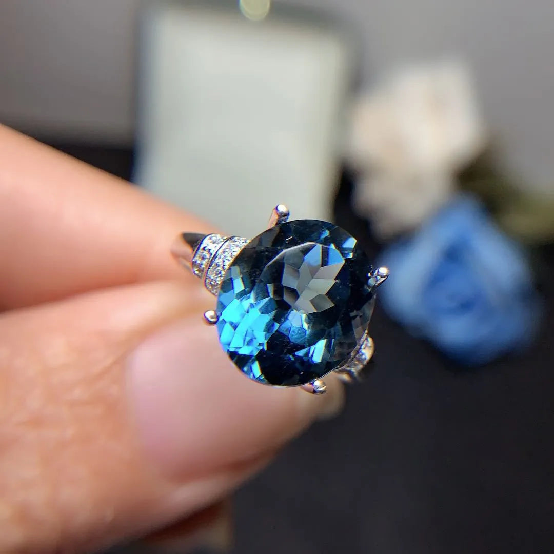 London Blue Topaz ring in deep dark blue crown cut on 925 silver with white gold plating adjustable opening