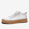 Men's black leather casual shoes with round toe and lace-up closure on a rubber sole