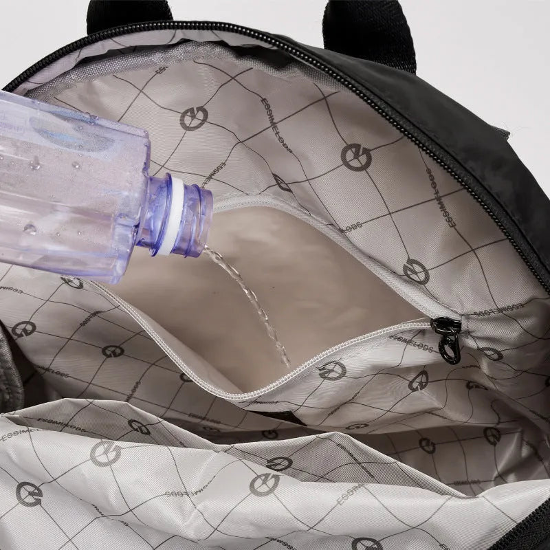 Outdoor backpack with large 48cm height, nylon construction, and sandwich pocket design in three colour options