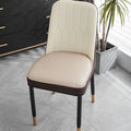 Leather horseshoe-shaped seat cushion shown in a solid colour on a chair